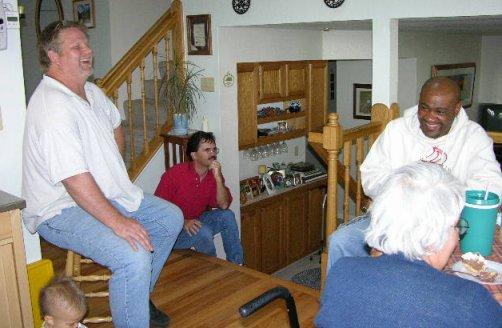 funnytime.jpg - Ron on left and James on right, laughing at something funny. I think Sandy was laughing too. Picture taken at Ron and Robin's house, Parker, Colorado, June, 2005.