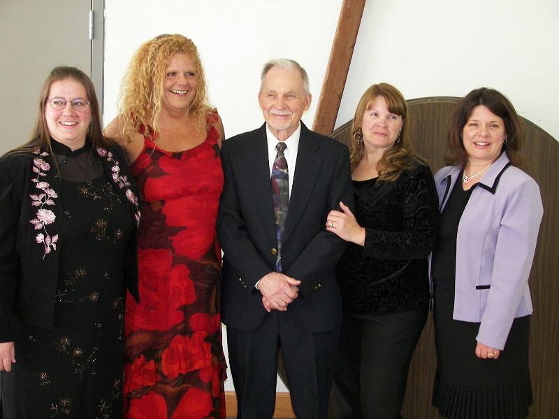 jimandgirls030708.JPG - Jim and 4 daughters at Sandy's Memorial Service March 7, 2008.  L to R  Erin Clark;  Noelle Shaffer;  Jim Clark;  Sandy Wenze;  Robin Chlarson.  Picture courtesy of Bob Shaw.